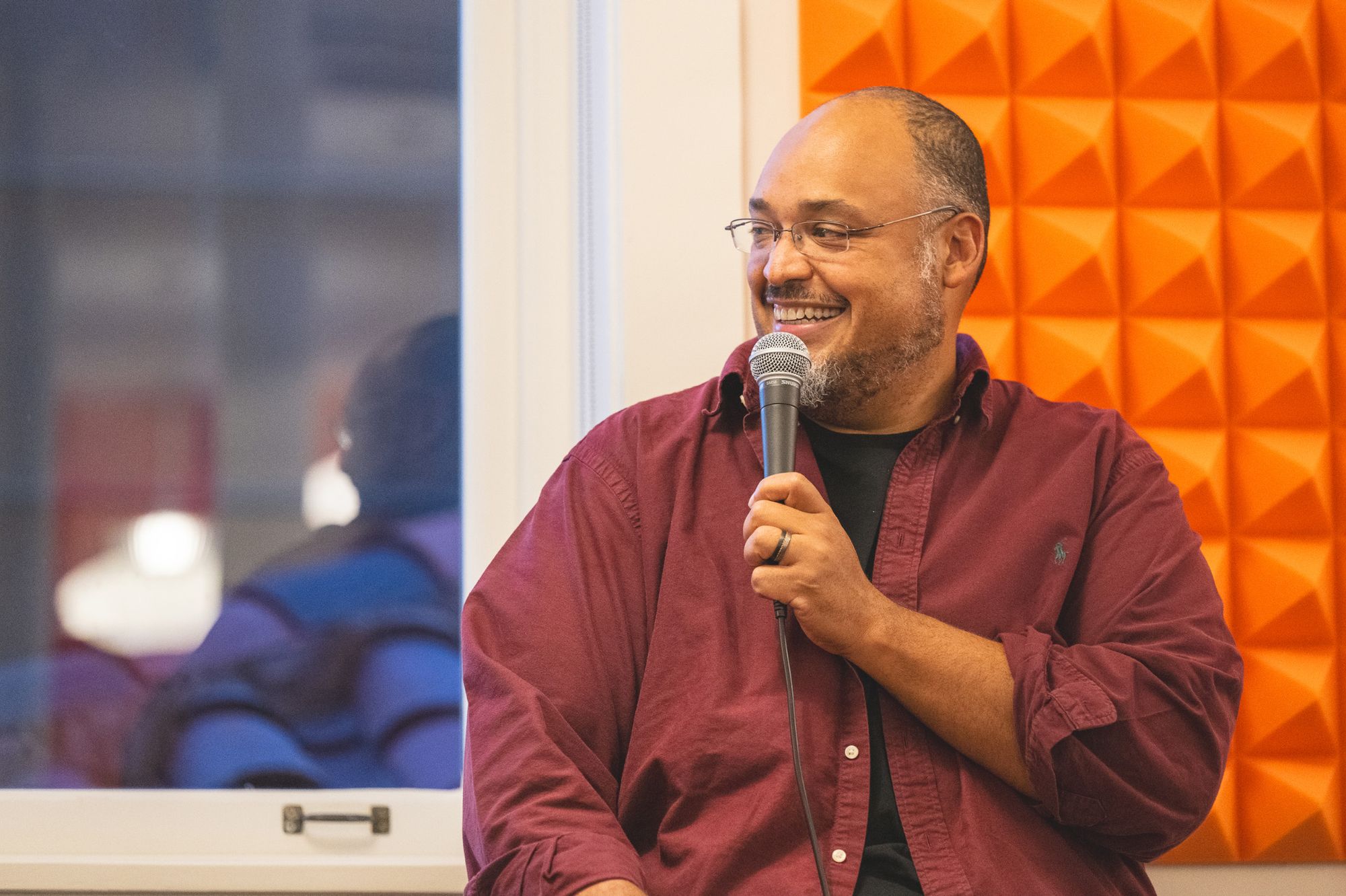 Y Combinator's Michael Seibel holding a microphone